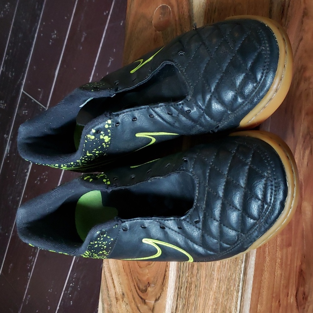 Nike Tiempo black & green size 8.  Pre-owned.   Need laces. Good condition.